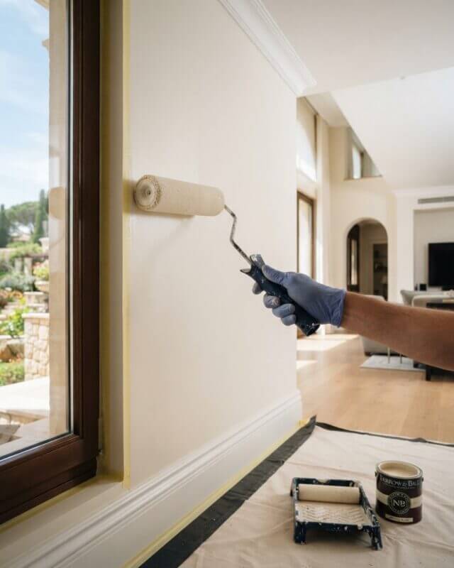 Flawless painting work with protected floors in a luxury villa